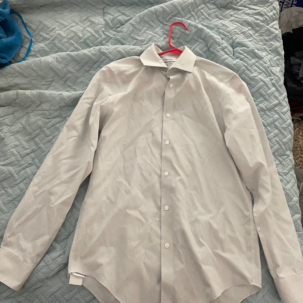 Never worn Calvin Klein men’s dress shirt.